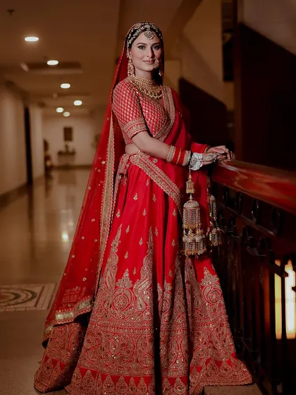 An elegant bridal portrait in a beautifully lit corridor.