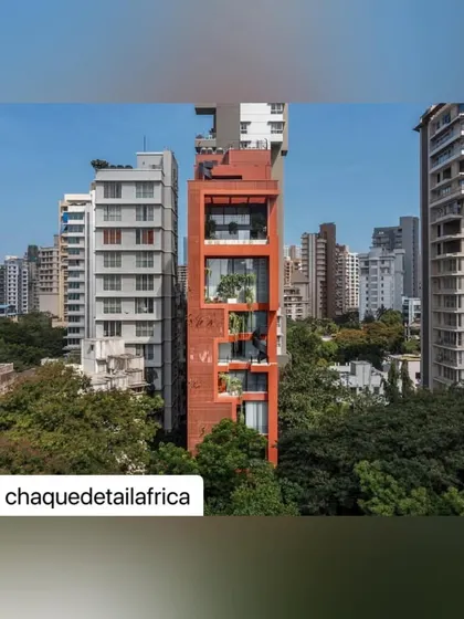 The full elevation of the Sarvasva tower, showing the unique, jagged opening that contains the building's primary green spaces and provides framed views of the city.