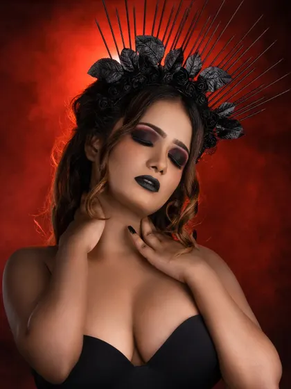 Another angle of the gothic queen concept, highlighting the contouring and the dramatic interplay of light and shadow. The black lipstick and smoky eyes create a cohesive, high-impact look.