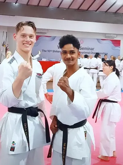 Making new friends on the international stage. Here I am with another black belt competitor at the Shitoryu Karatedo International Championships.