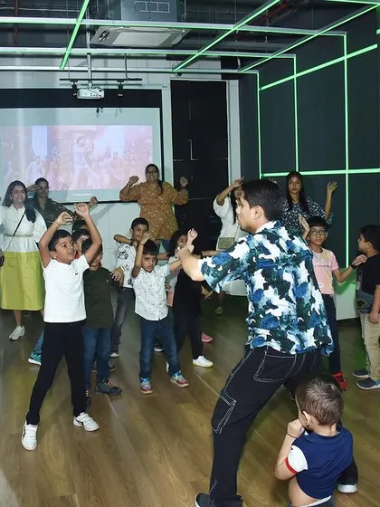 Moments from a high-energy dance party and workshop for kids. These events are full of fun, learning basic choreography, and enjoying dance in a group.