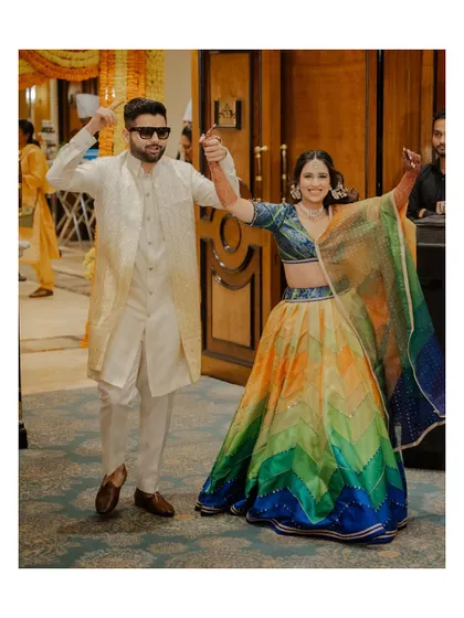 Making their grand entrance for the Haldi ceremony, full of energy and ready for the fun to begin.