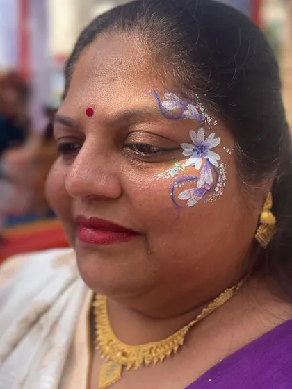 Another beautiful aunty enjoying my art. This delicate floral design with a touch of glitter suited her so perfectly.
