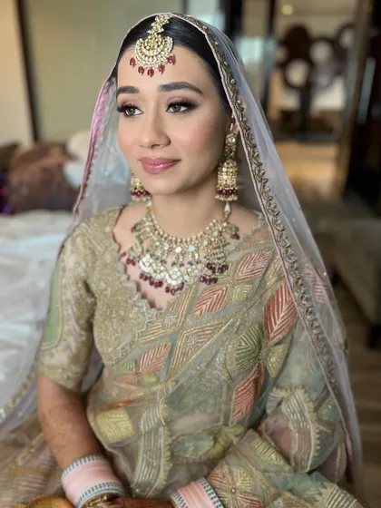 This is so beautiful. A soft and subtle look for a Sikh bride in a pastel suit. The makeup is minimal and elegant.