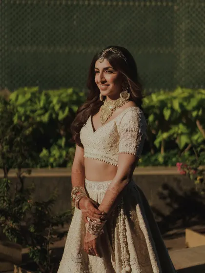 A candid, happy moment. Sheena's golden hour glow is natural and radiant, perfect for an outdoor wedding.