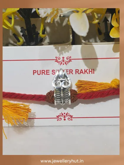A powerful Trishul and Rudraksha Rakhi, crafted in pure silver for a brother who is a devotee of Lord Shiva.