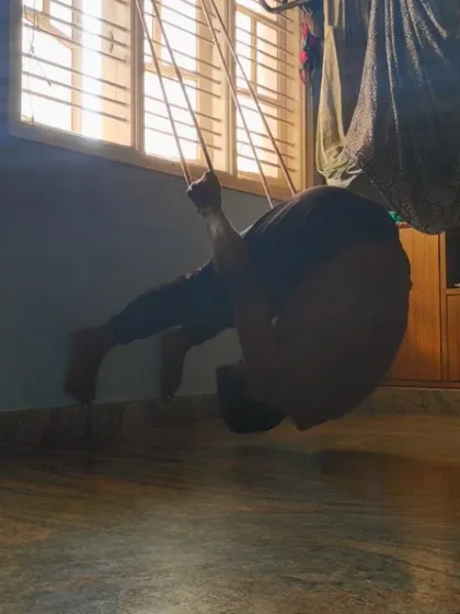 Exploring a deep spinal extension and shoulder flexion using a DIY rope setup at home. This helps prepare the body for advanced backbends by working against gravity.