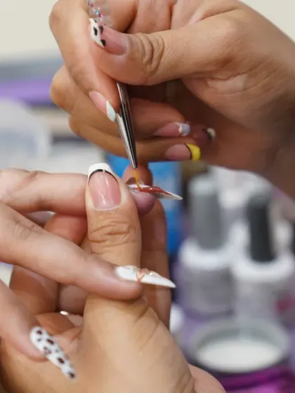 Every stroke matters in creating our detailed 3D nail art. We ensure each design is perfectly placed for a stunning final look.