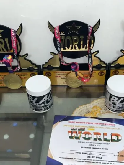 My collection of trophies and medals from the Mr. World competition. This is the proof of my dedication to the sport and the expertise I bring to my coaching.
