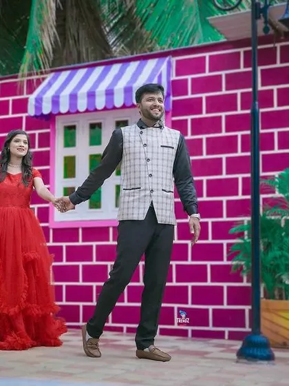 Having fun with colorful and quirky backdrops. This studio set is perfect for couples who want a playful and vibrant pre-wedding shoot.