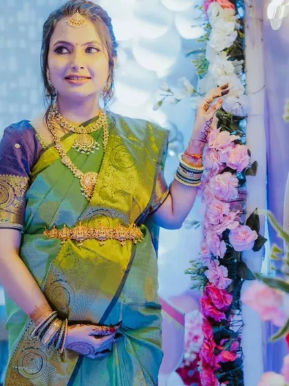 Your special moments deserve a special sparkle. This happy client is glowing at her baby shower in a beautiful South Indian temple jewellery set, proving that renting is a perfect option for all of life's celebrations.