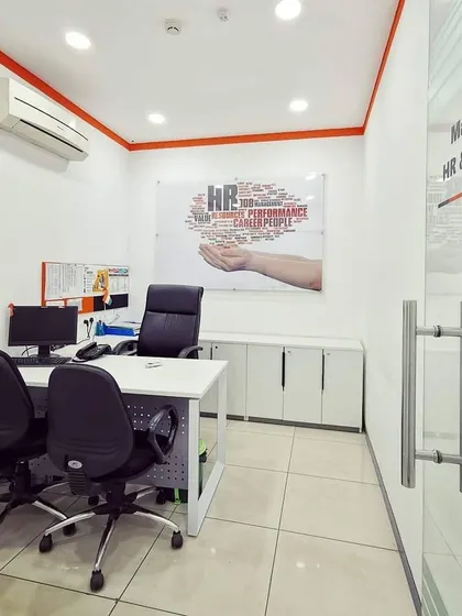 The HR and Admin office, a private yet accessible space with a glass door. The design is clean, professional, and functional for its administrative purpose.