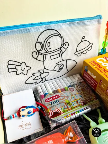 The DIY coloring pouch from our kids' Rakhi hamper, featuring a cute astronaut design that kids can color themselves.