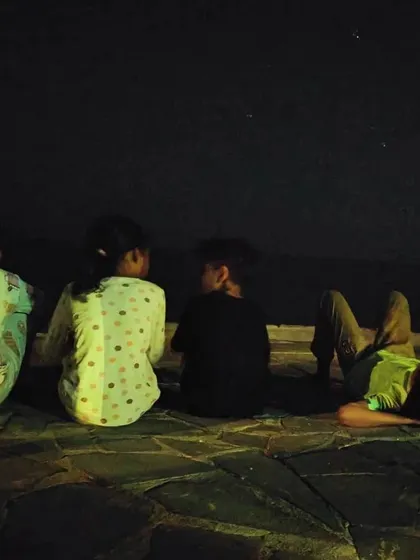 Stargazing by the sea. Away from the city lights, the night sky opens up, offering a breathtaking lesson in astronomy and our place in the universe.