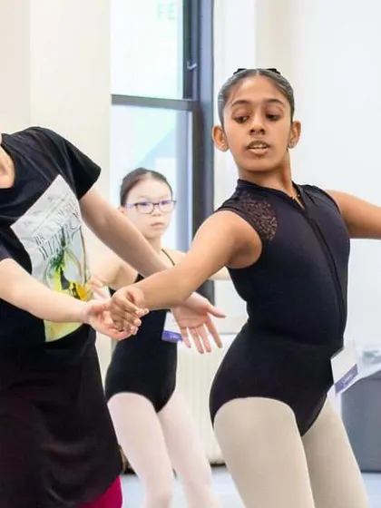 Sanvitti Sai Roopesh at the Joffrey Ballet School’s NYC Summer Intensive. Here she receives a correction, absorbing every detail to refine her artistry and technique.