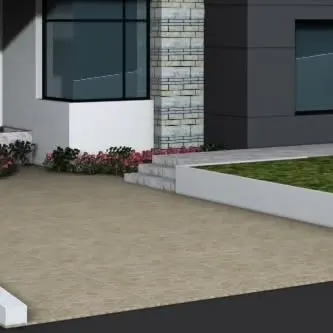 A detailed look at the material palette for a residence, showing the combination of paved driveway, stone cladding on the wall, and a raised lawn. This demonstrates our focus on texture and material harmony in site design.