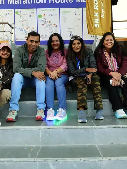 Our group relaxing at the marathon expo before the big race. The anticipation and team spirit are high.