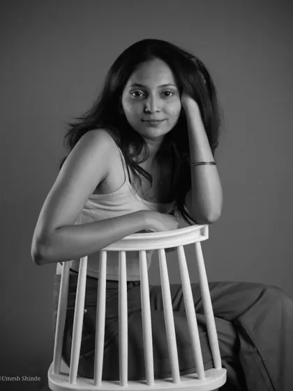 I love the timeless feel of black and white photography. This seated portrait uses simple, clean lighting to create a classic and elegant look.