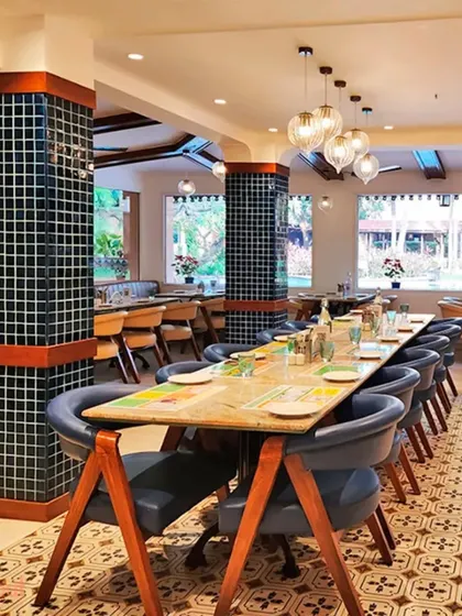 The indoor dining space at the Lemontree resort in Goa. We used dark blue tiled pillars and patterned flooring to create a bold, graphic look that is both contemporary and rooted in local design traditions.