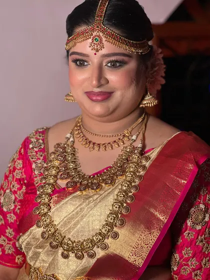A happy bride is the prettiest bride. This shot captures Aishwarya's joy, with her dewy makeup and traditional jewellery shining through.