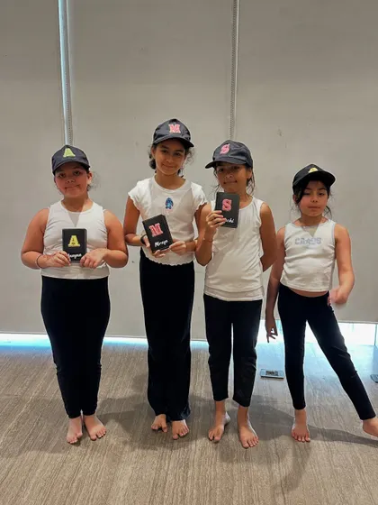 A group of proud young yogis from our International Yoga Day celebration. We are dedicated to passing on India's gift of yoga to the next generation in a way that is fun and meaningful.
