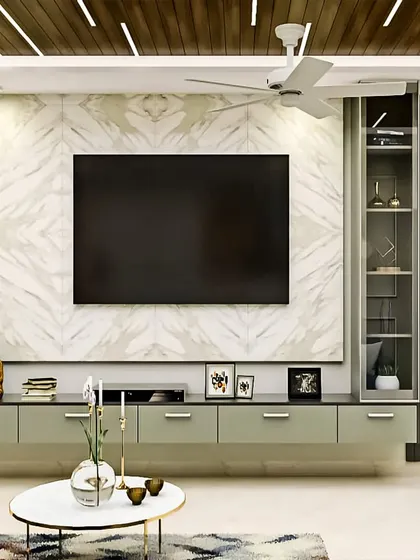 A well-designed TV unit can be the centerpiece of a living room. This floating console provides ample storage to keep things tidy, while the marble back-paneling and fluted side panels add texture and a touch of modern elegance.