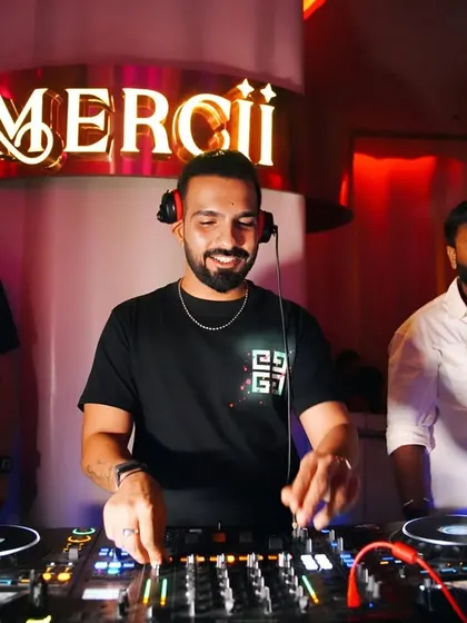 A smiling shot from behind the console at Mercii. Loving every minute of the party.