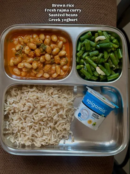 This plate of brown rice, fresh rajma curry, sautéed beans, and Greek yogurt shows a typical healthy meal. Moderation is key, and a sustainable diet is the best diet for you.