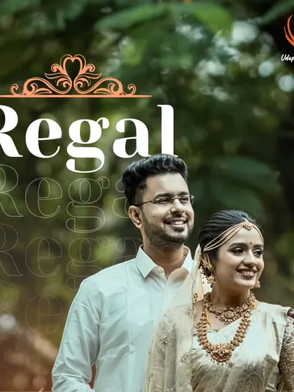 A regal portrait of a wedding couple at our Mukta venue. The lush green foliage provides a simple yet elegant backdrop, highlighting the beauty of traditional wedding attire.
