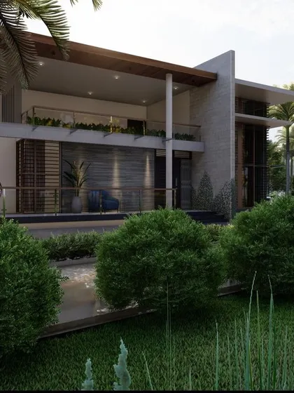 This proposed design for a client in Shimoga features a tropical modern aesthetic. The architecture incorporates large overhangs for shade, natural materials, and lush landscaping to create a resort-like feel.