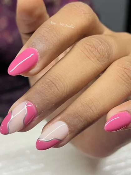 A modern take on floral nails, with clean lines and a pop of pink.