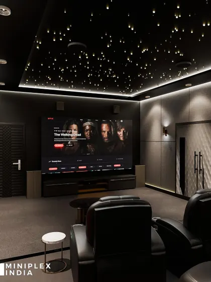 Welcome to the 'Celestial Escape'. This design features a stunning galaxy ceiling, sleek black recliners, and integrated wall lighting for a modern, high-tech feel.