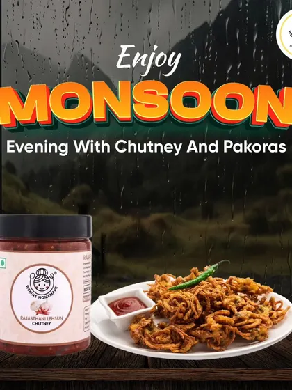 Enjoy a perfect monsoon evening with crispy onion pakoras and our spicy Rajasthani Lehsun Chutney. It's the ideal combo for a rainy day.