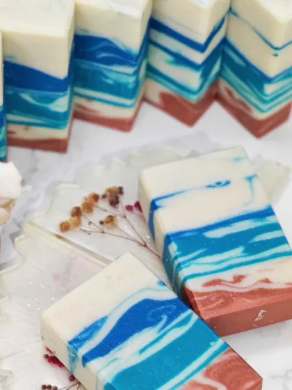 A beautiful display of layered ocean-themed soaps.
