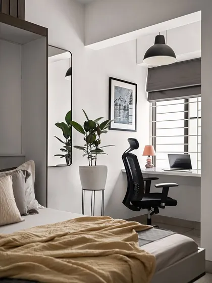 The guest room in the 'Nordic Grey Apartment' also serves as a home office, with a desk perfectly positioned in a light-filled niche.
