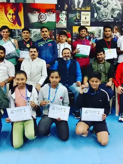 Our team of champions. This is a group photo of our students and coaches after a successful run at the 4th Delhi Open Boxing Championship, where we won 7 gold and 6 silver medals. We train as a team and we win as a team.