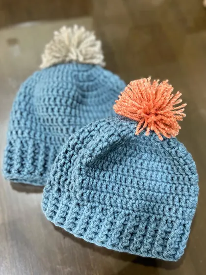 Here are some matching baby beanies I made for siblings. This set is for ages 0-6 months and 6-12 months, but I can create them in any size, even for adults, so the whole family can match.