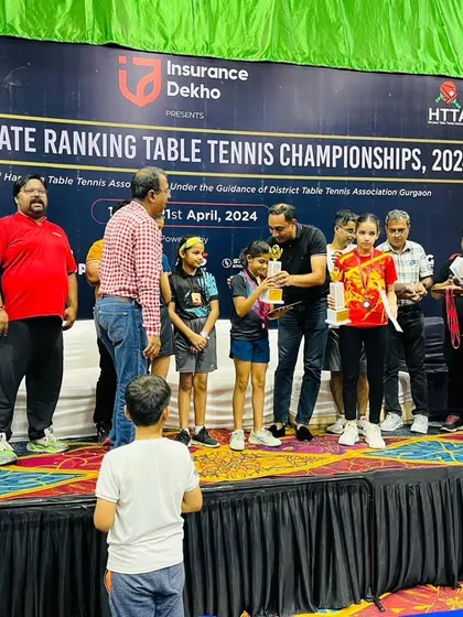 Another angle of the award ceremony, highlighting the formal recognition of our players' achievements in a competitive setting.
