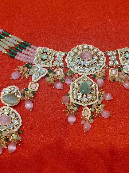 A product shot of the pastel pink and green choker set. You can see the detailed craftsmanship and the quality of the stones and beads I use in my custom work.