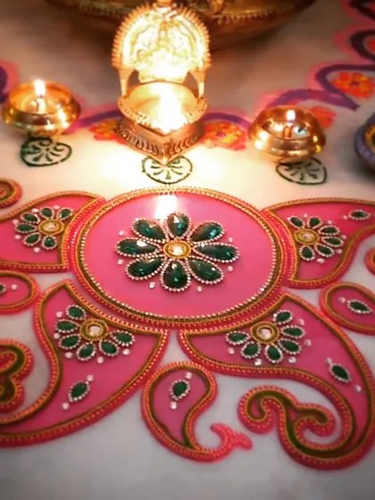 A handmade Kundan Rangoli, perfect for festive occasions like Diwali. This reusable decor piece is crafted with a sturdy base, colorful rhinestones, and intricate 3D liner work, bringing a touch of sparkle to your celebrations.