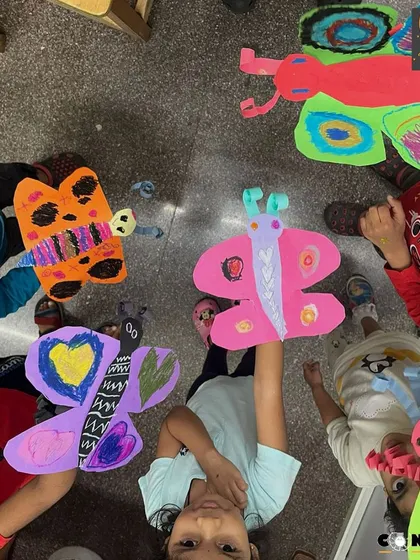 A sky full of butterflies! Each child designed their own butterfly, and we love seeing all the different patterns and colors they came up with.