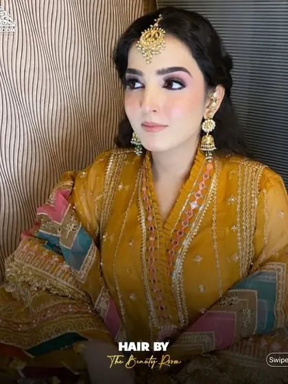 A side view of the half-updo, showing how it creates volume at the crown and frames the face.