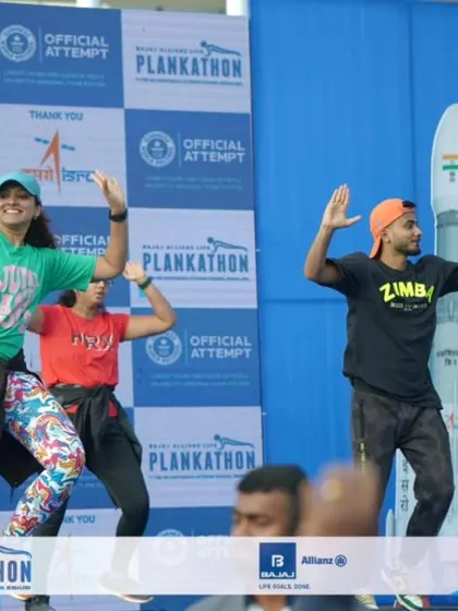 Leading the Zumba warm-up at the Bajaj Allianz Life Plankathon in Bengaluru. We were thrilled to get the energy soaring at Kanteerava Stadium for this record-setting event.