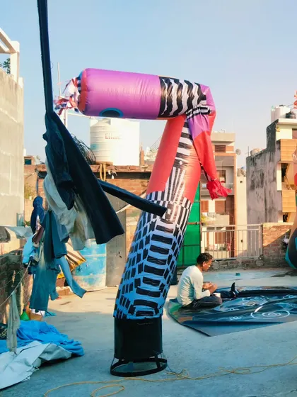 A still shot of one of the abstract art style air dancers. Even without a specific character, the unique patterns and colors make it a real eye-catcher.