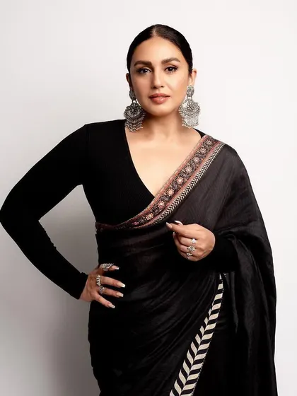 For the Lokmat Most Stylish Awards, we created a powerful and chic look with this black JJ Valaya saree. The modern, full-sleeve blouse and statement silver Amrapali earrings give it a contemporary edge.