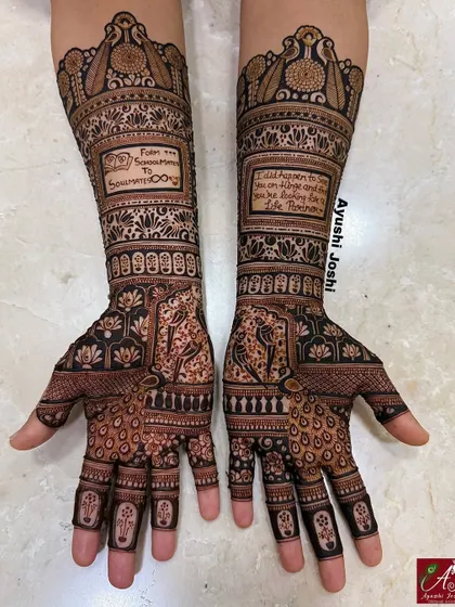 A beautiful engagement design telling the story of a couple who went from schoolmates to soulmates, with their story written right into the henna.