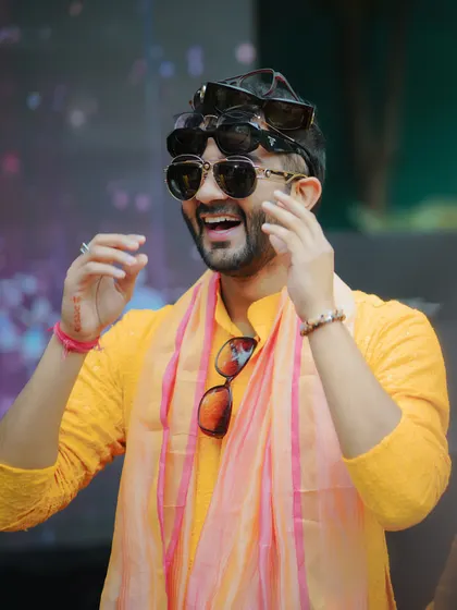 The groom shares a laugh during a playful moment at his Haldi. Capturing genuine laughter is one of my favorite parts of the job.