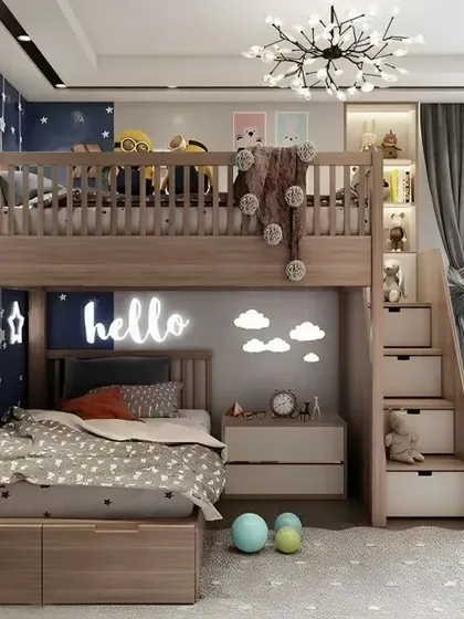 A dreamy, space-themed kids' room with a bunk bed featuring stair storage and celestial wall decor.