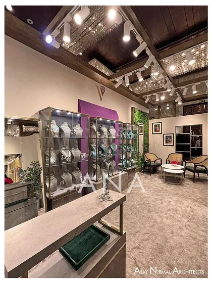 The interior of the Villandi '22 stall was zoned for circulation, with jewellery displays on one side and a private discussion area on the other. This layout ensures a comfortable and efficient client experience.