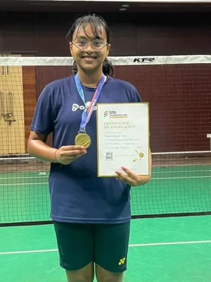 Saisha Naik with her gold medal and certificate of excellence, a result of her dedicated training at our Sachivalaya Gymkhana center.